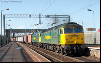 57011 and 57004 passing Bescot